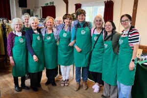 Pop up shop volunteers standing as a group